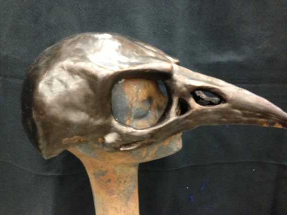 Bronze bird skull mask