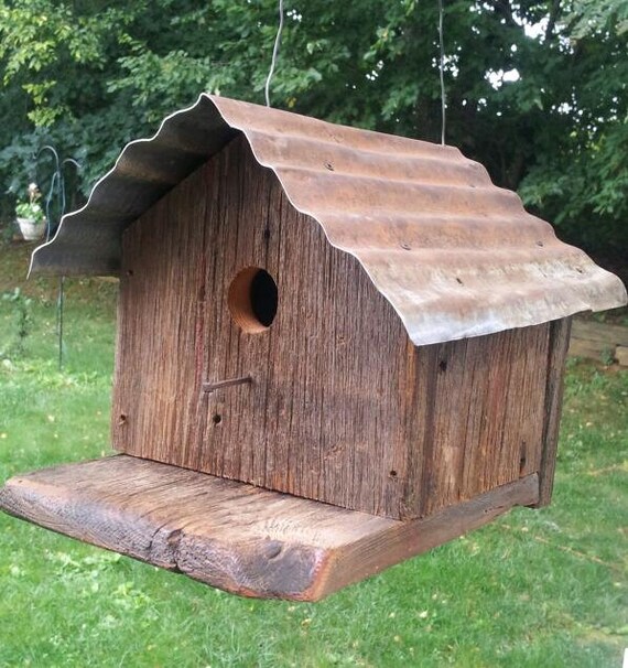 Hand made barn wood bird house. Weathered oak with Tin roof