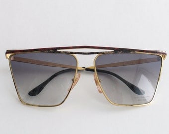Laura Biagiotti beautiful vintage sunglasses for women. Made in Italy in the 80's.