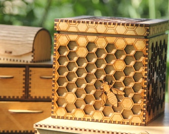 Unique box featuring an intricate honeycomb and bees - precision lasercut and varnished to a beautiful golden finish.