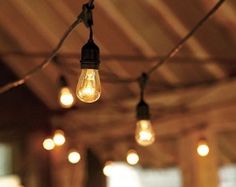 Outdoor string lighting for wedding party patio by LilikoiandCo