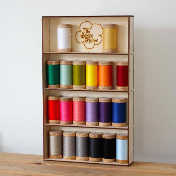 Wooden sewing thread shelves