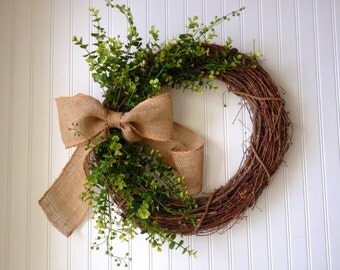Boxwood wreath with large burlap bow. boxwood wreath. wreath for door. fall wreath. fall door wreath. wreath for fall. fall decor. wreath