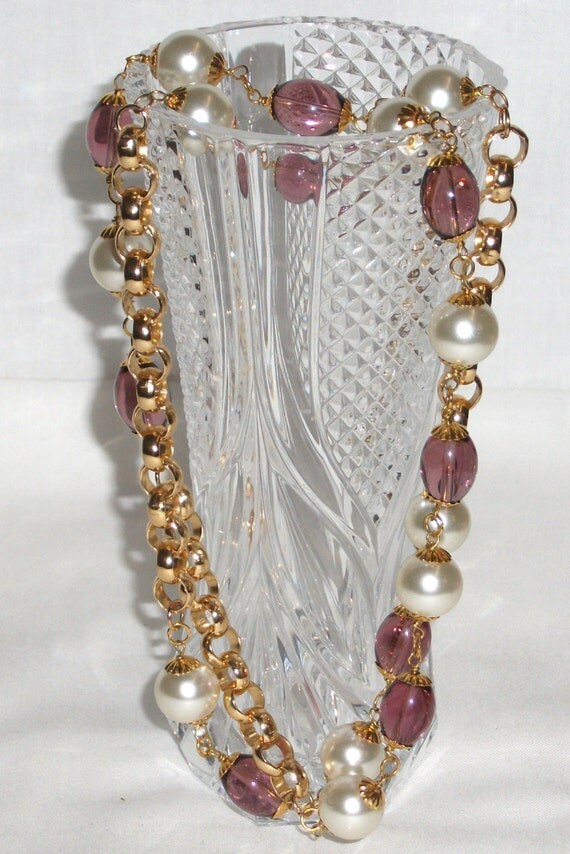 Necklace with golden color chain. Wine colored quartz beads