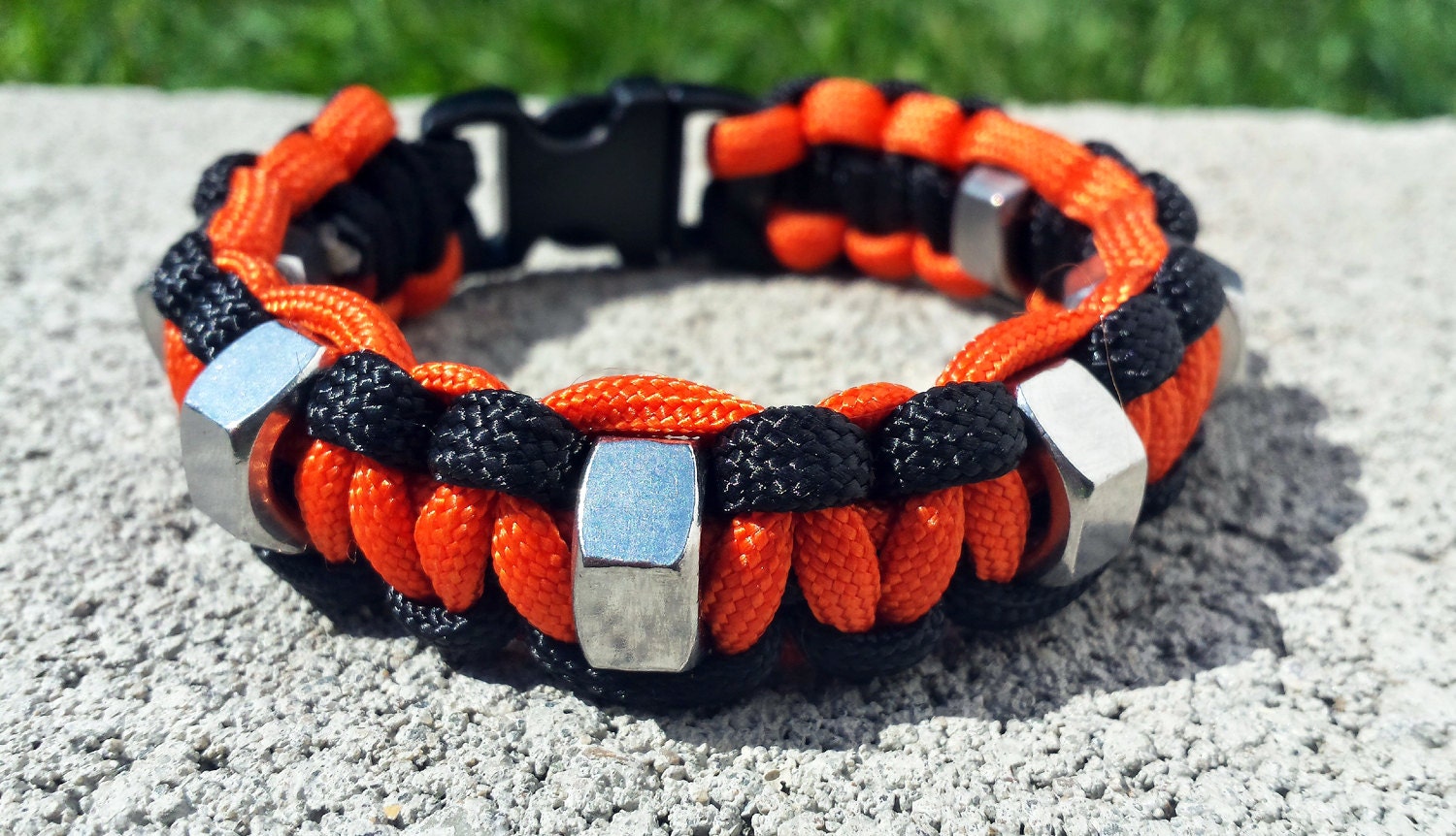 Orange and Black Paracord Hex Nut Bracelet by NorthwestKnotworks