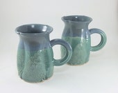 pair of pretty blue and green mugs