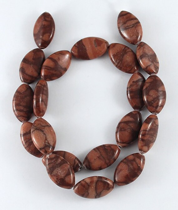 1/2 strand of 11x19mm red zebra jasper oval beads by bunnysundries