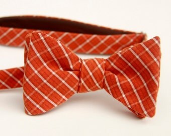 Rust and white plaid freestyle bow tie