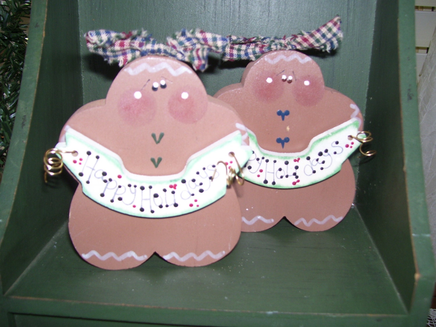 Handmade and hand painted Chubby Gingerbread Girl holding sign