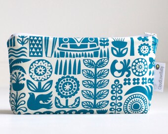 ... beach bag. small. blue. graphic print. wet bag. waterproof. make up