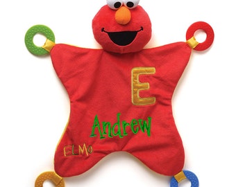 elmo with a blanket elmo stuffed animal