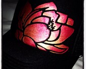 Black trucker with goldy/deep red ombré lotus