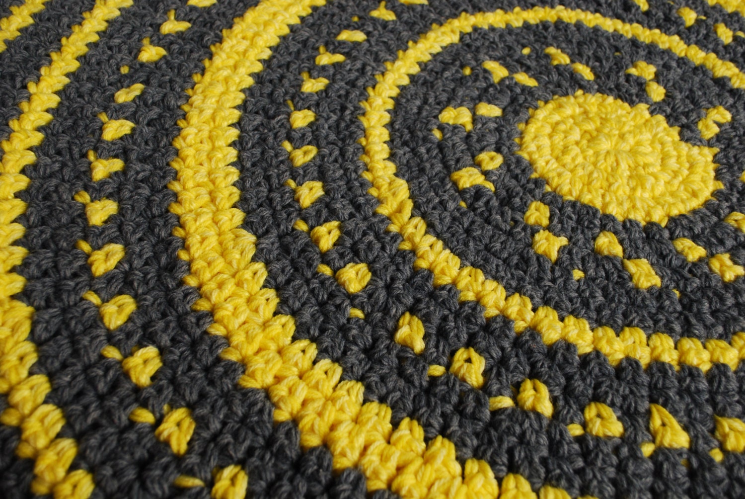 Gray and yellow handmade circle rug