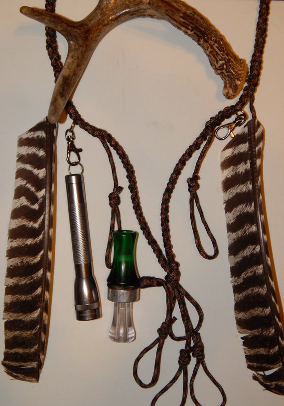 Duck hunting paracord lanyard with turkey feathers holds up