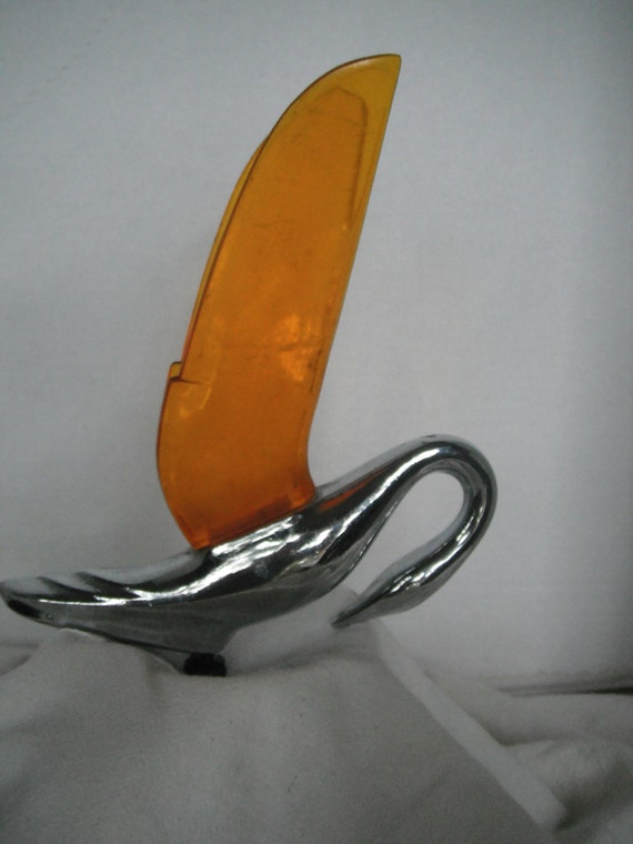 Vintage swan hood ornaments with amber wings by yonderyears