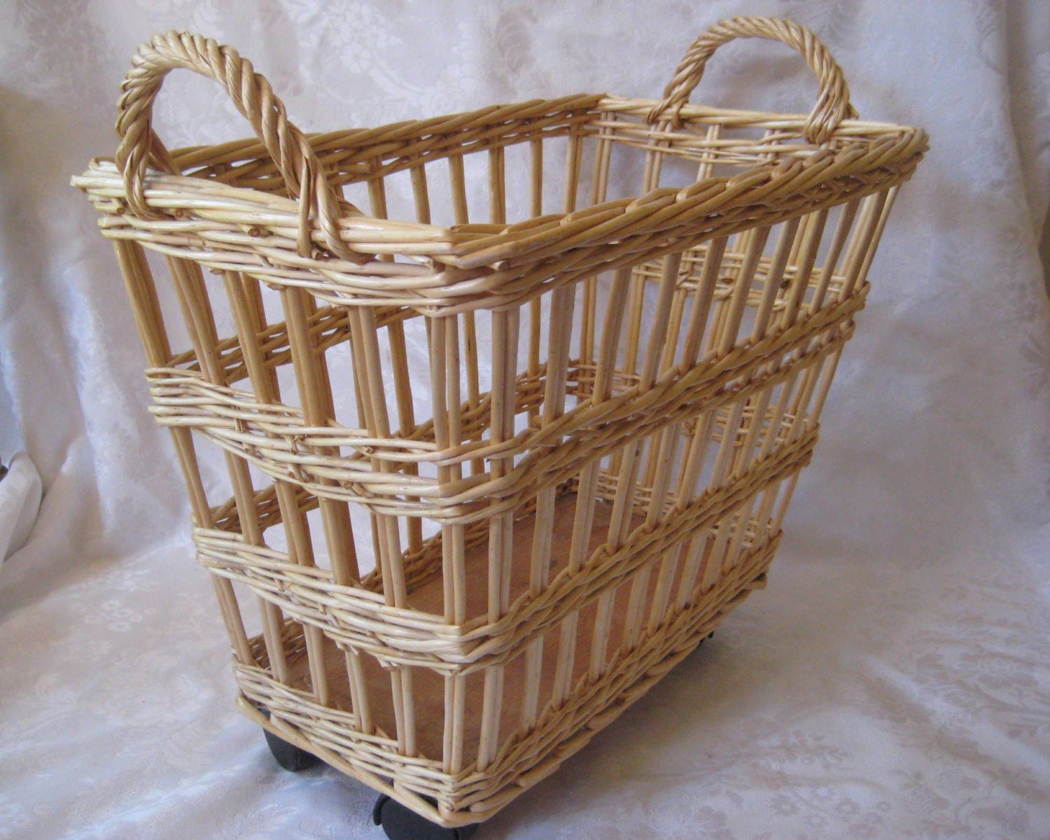Wicker magazine basket on wheels with handles magazine rack