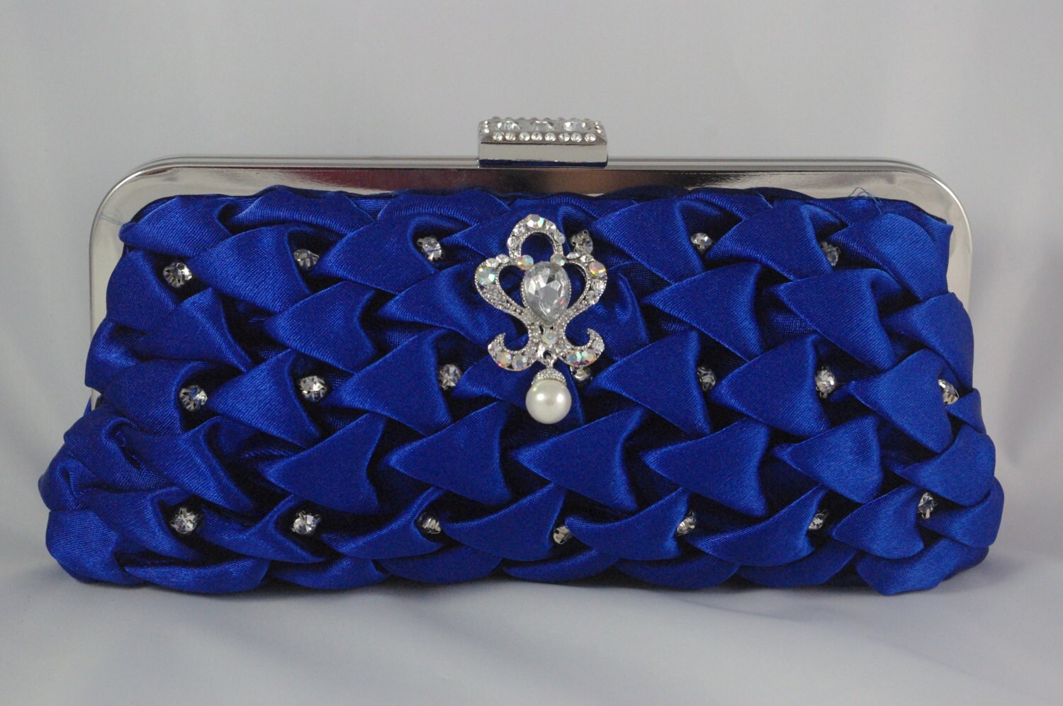 royal blue and silver clutch bag