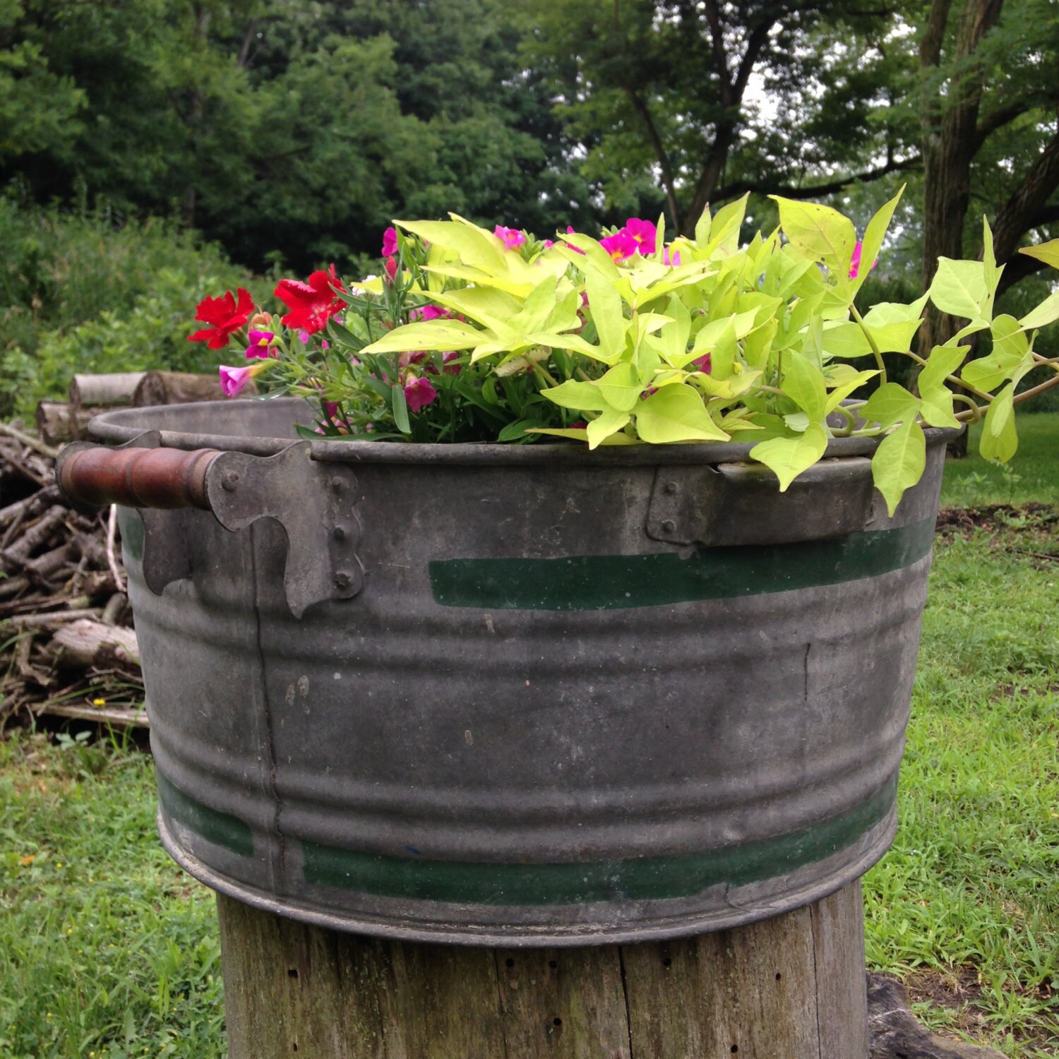 Vintage galvanized large wash tub with wooden handles and