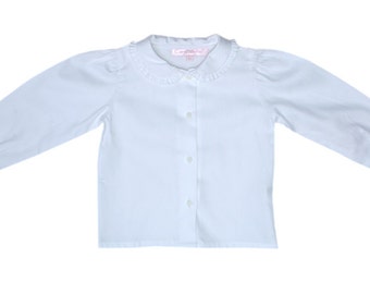 Longsleeve White Shirt. Comfortable shirt. With frills around the Peter Pan collar and cuffs on the sleeves. Available in all sizes 17505