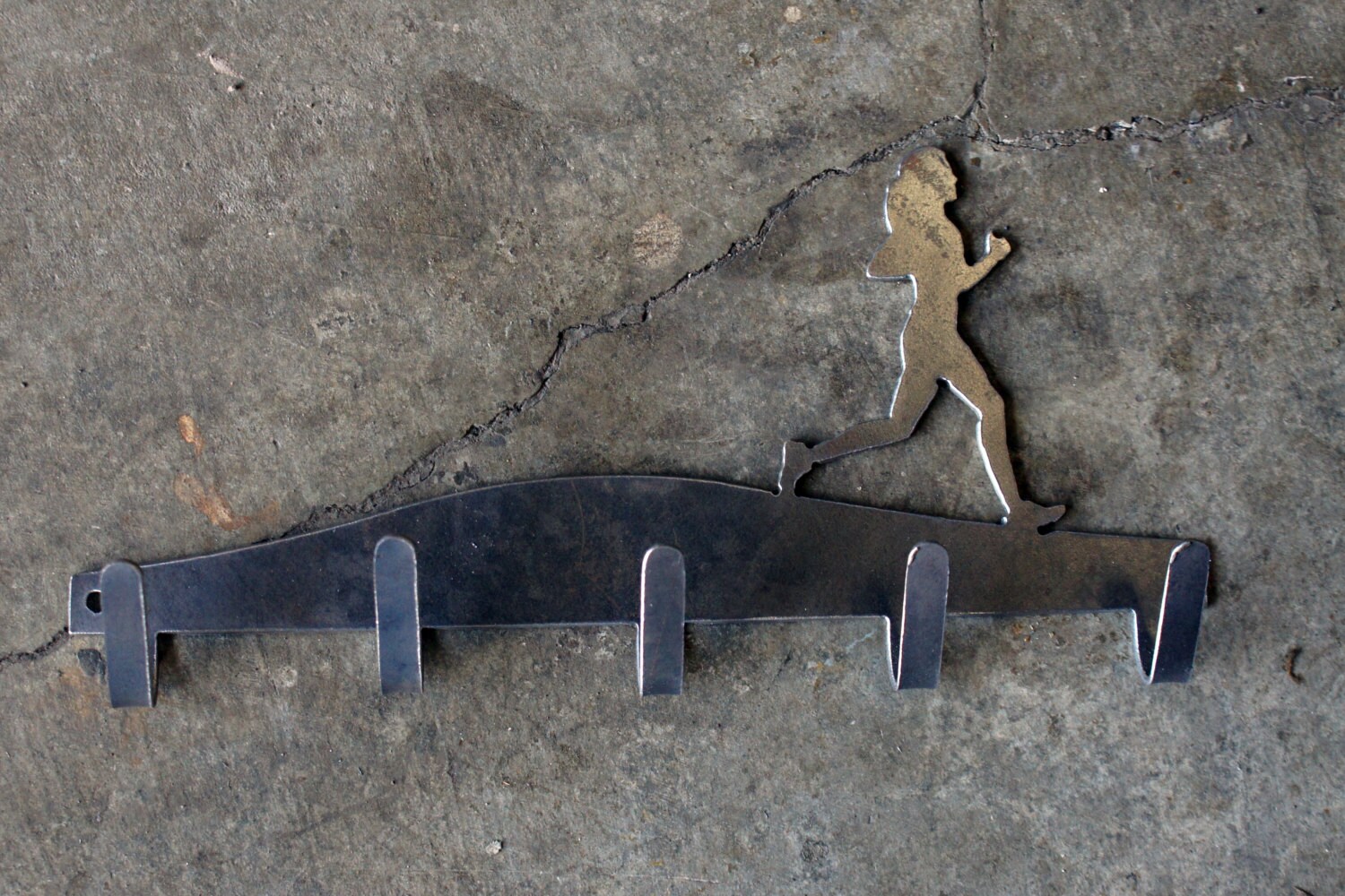 Steel running medal holder for women