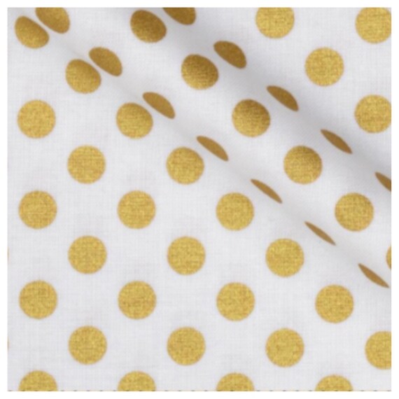 changing pad cover in gold dots