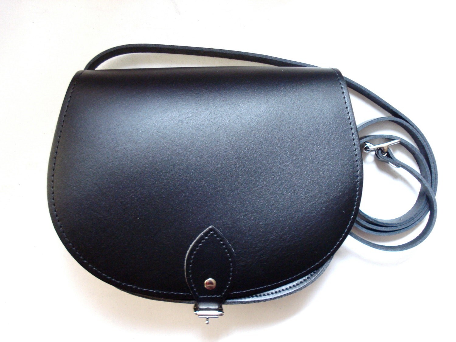 small black saddle bag