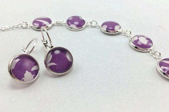 Items similar to Purple and White Lovely Earrings and Bracelet on Etsy