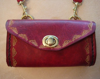 red tooled leather purse