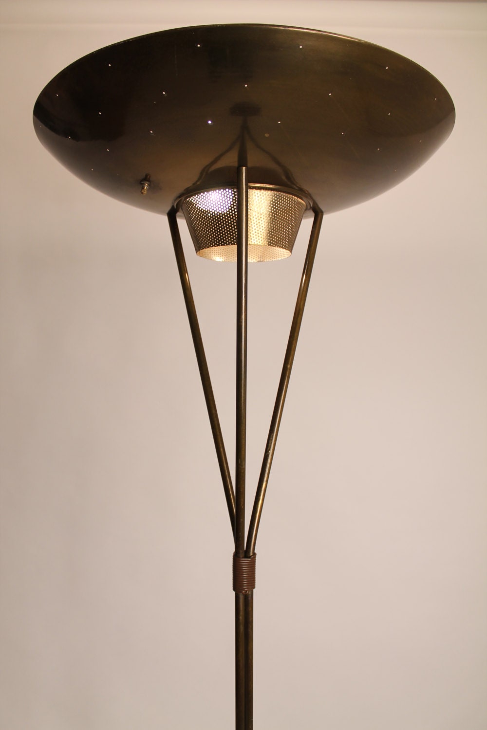 XLARGE pierced BRASS TORCHIERE in the manners of Lightolier