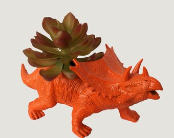 orange triceratops stuffed animal