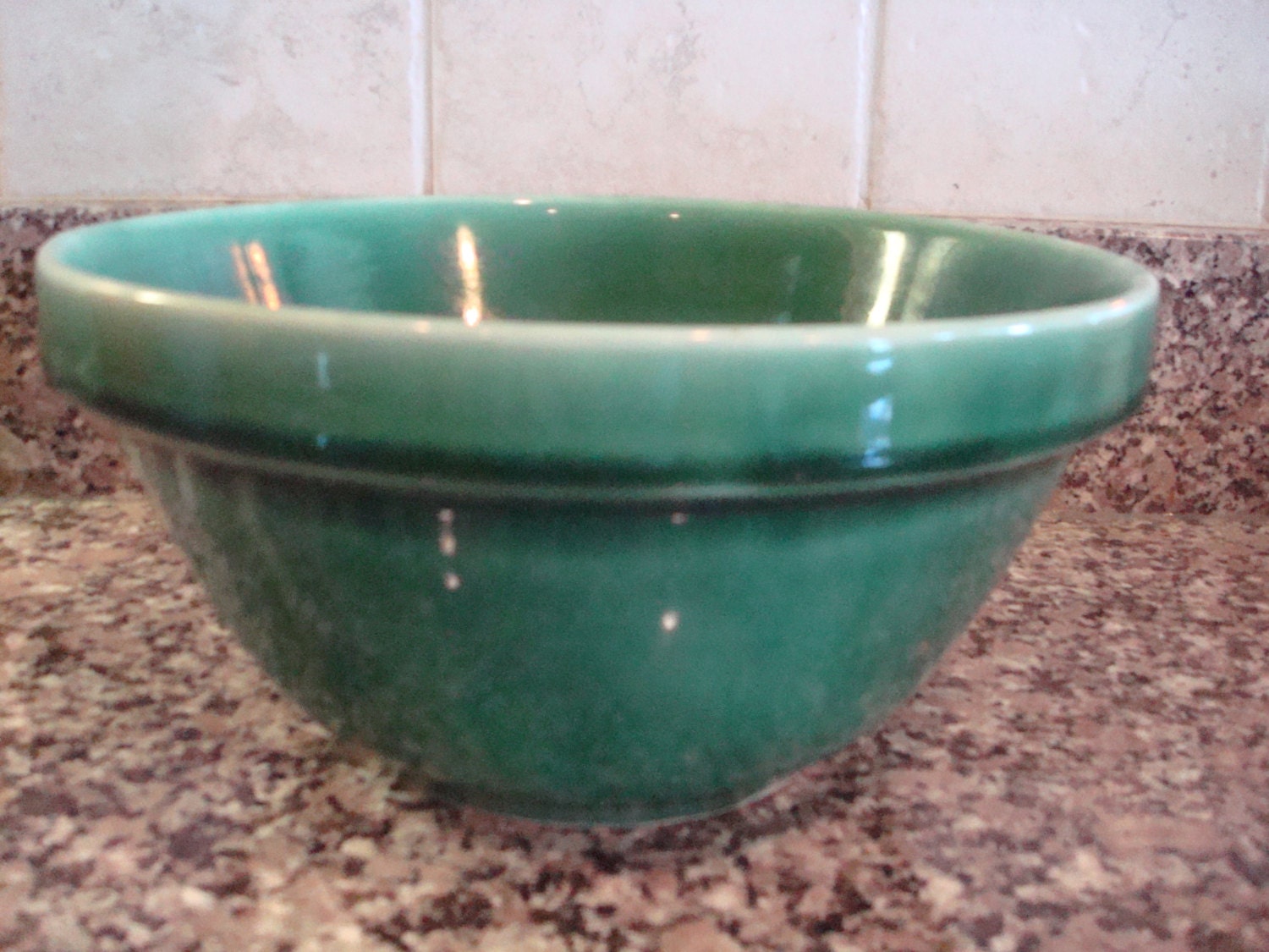 Beautiful vintage green glazed pottery bowl