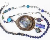 Your Astonishing Light. Cosmic rustic Victorian tribal assemblage iridescent blue necklace with geisha.