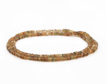 necklace of brown-green tourmaline and gold
