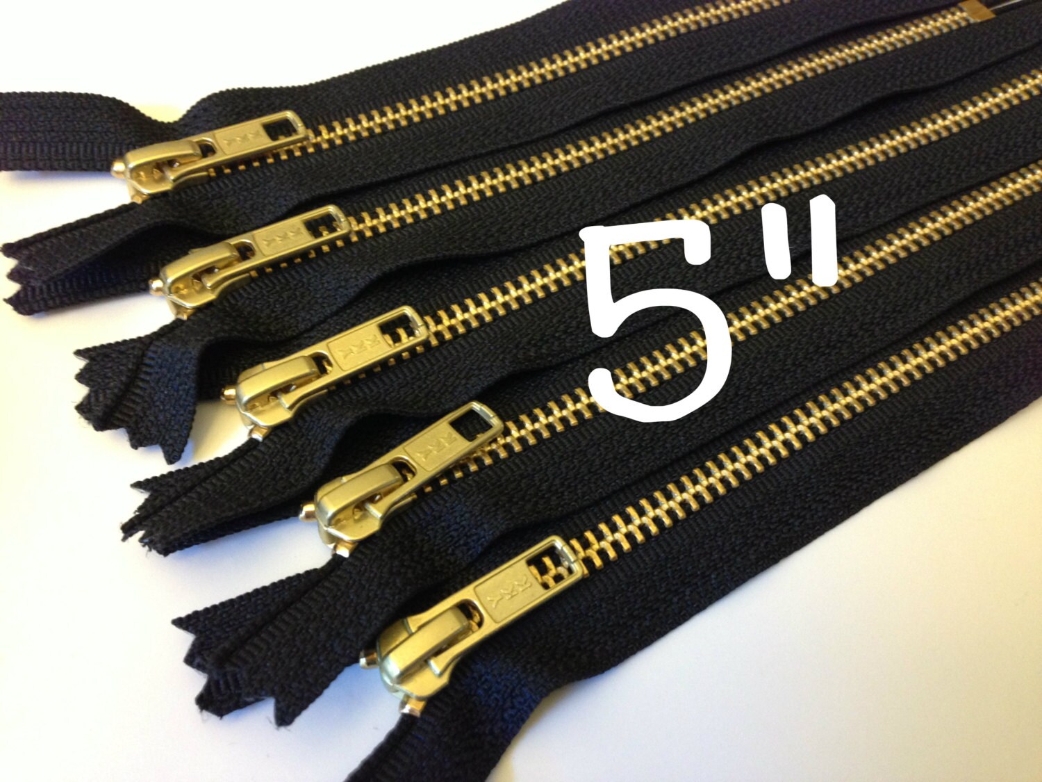 Gold teeth zippers 5 inch brass YKK zippers with black tape