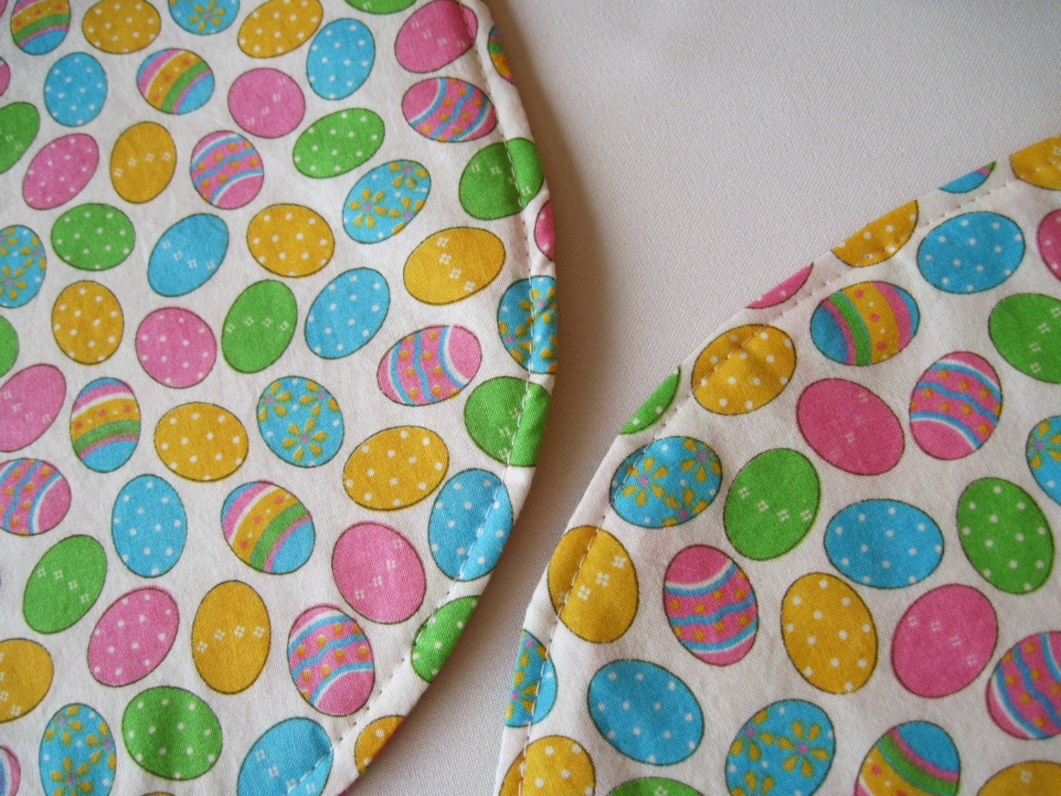 2 Easter Placemats Oval Reversible Colored Decorated Eggs