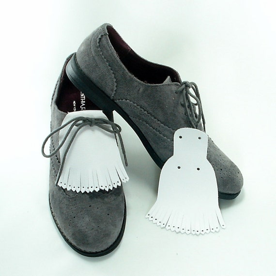 shoes with tassels on them