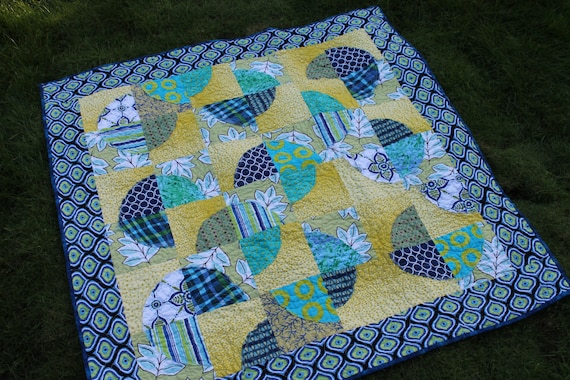 Playful Baby Quilt featuring Raw Edge Applique Circles in Blue, Turquoise, White and Acid Yellow