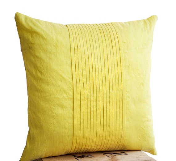 Throw pillows in yellow art silk  Attractive cushion in rippled pin 