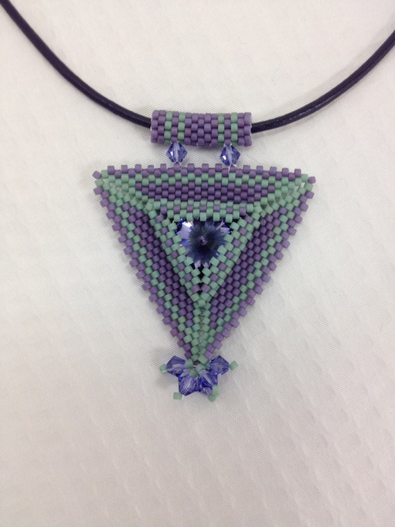 Items similar to Triangle pendant necklace on Etsy