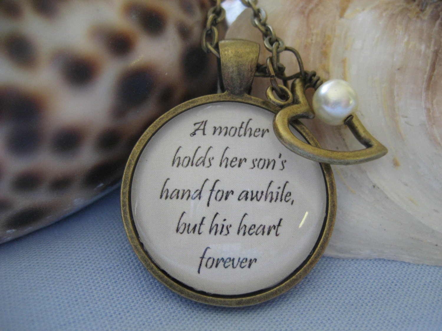 Download A Mother Holds Her Son's Hand For Awhile But His Heart