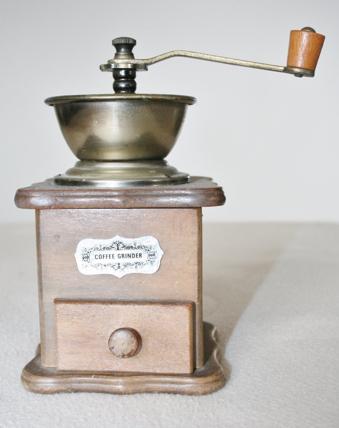 Charming wooden coffee grinder