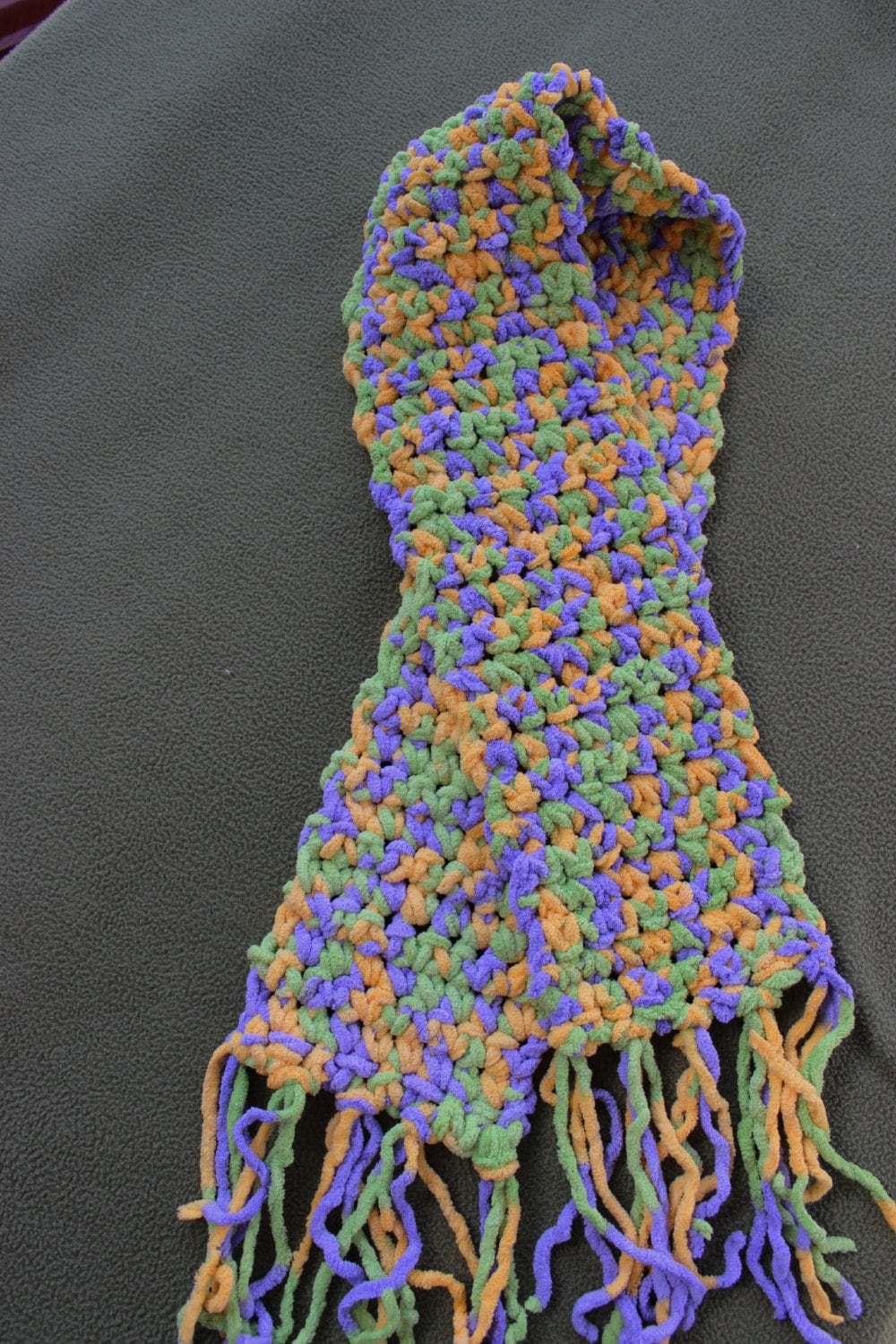 hand crocheted scarf stitched in bulky chenille yarn in