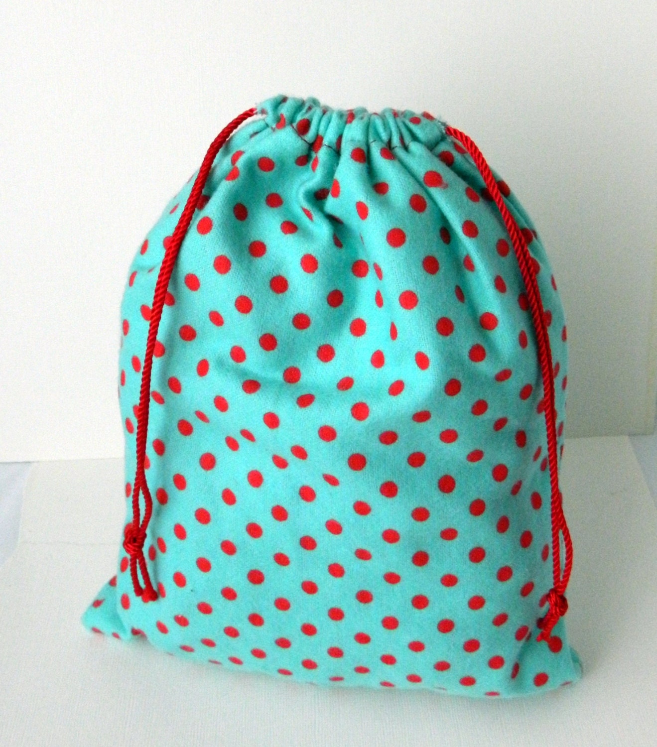 red polka dot bag