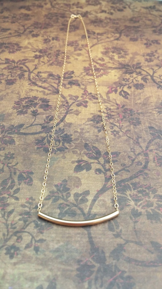 gold curved tube necklace