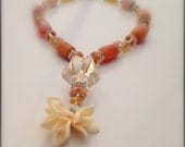 Beautiful  Vintage orange agate nuggets gemstone Necklace with stunning antique french glass bead and flowers as a pendant