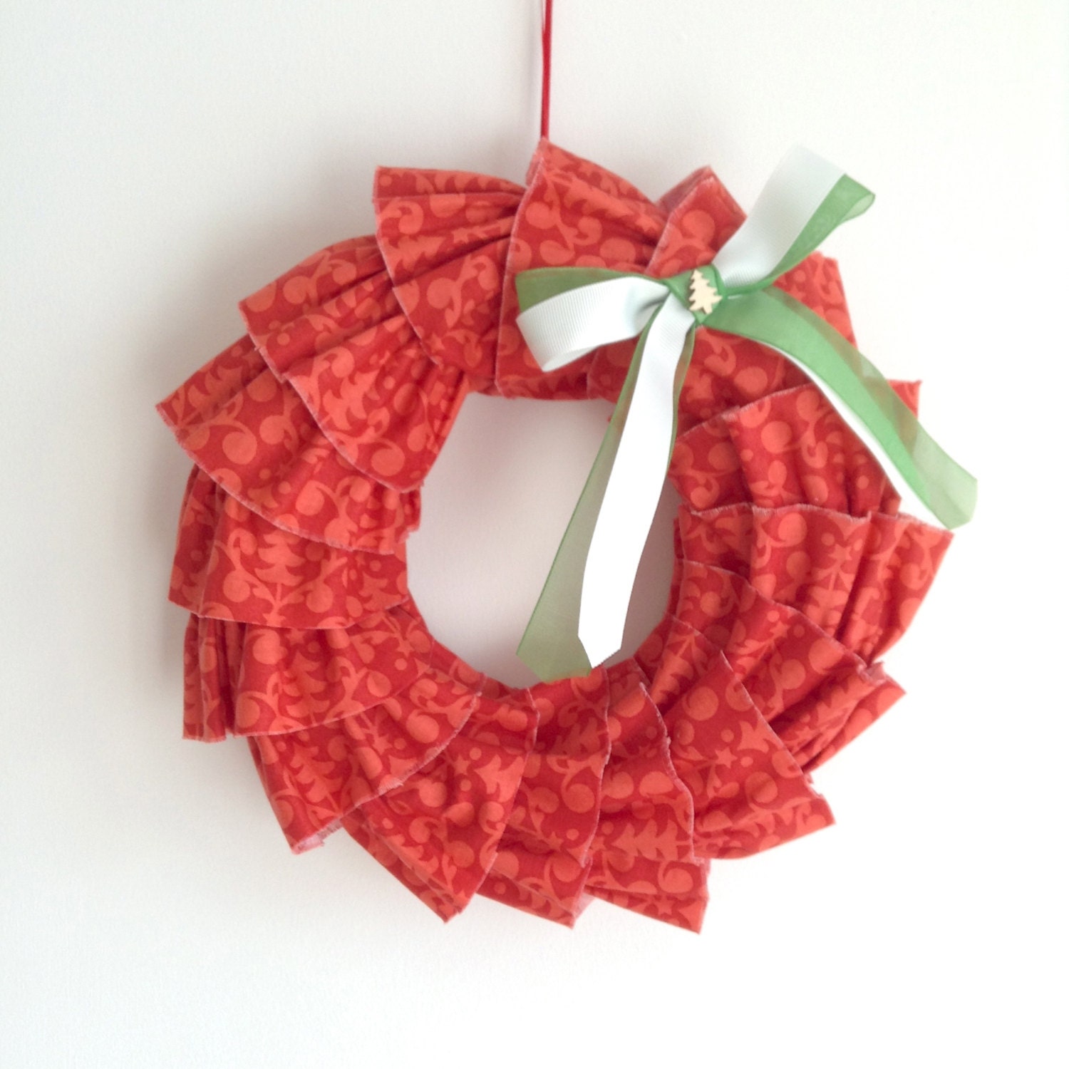 Christmas wreath - frilly fabric - festive red trees - white green bow