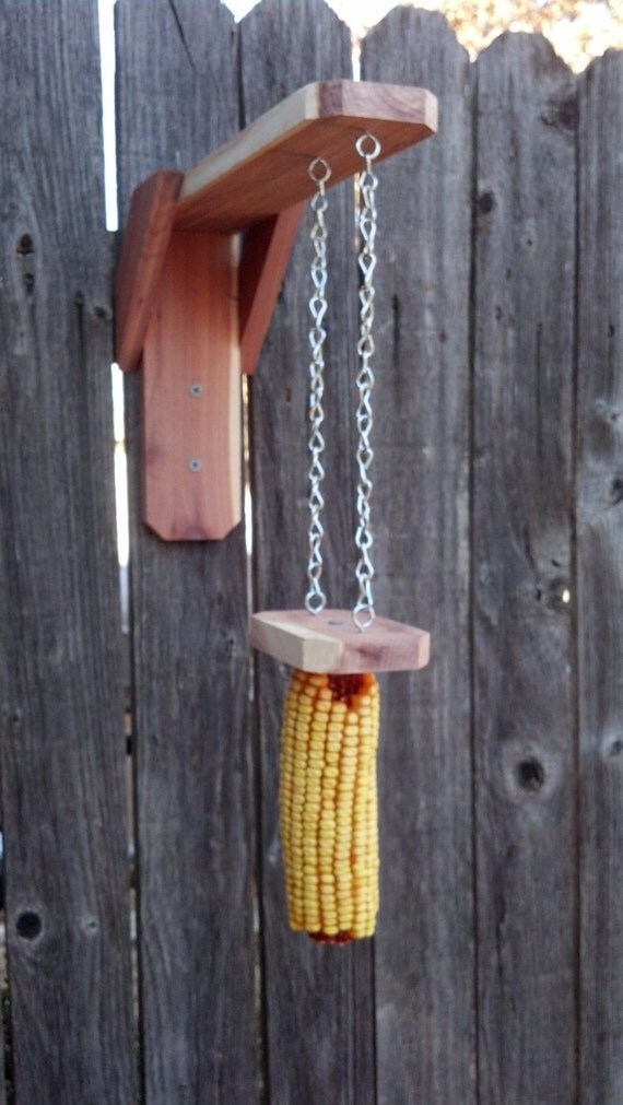 Items similar to Eastern Red Cedar Swinging Squirrel Feeder on Etsy