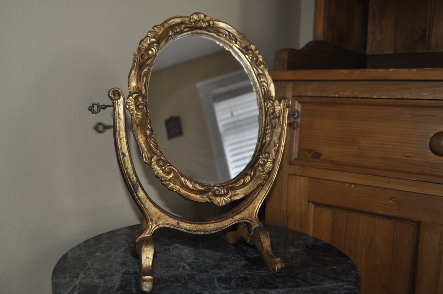 Hand carved vintage standing mirror. Antique gold/red/black