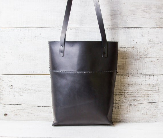 black bag with white stitching