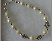 Ivory glass pearl and silver tibetan flowers bracelet